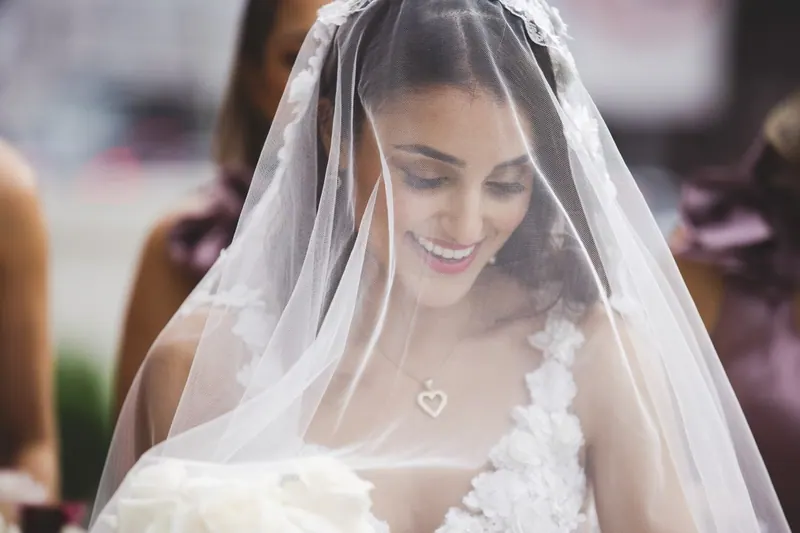 Alexandra’s couture wedding dress by Catherine Colubriale