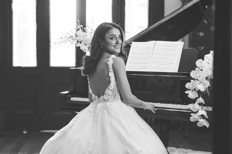 Alexandra’s couture wedding dress by Catherine Colubriale