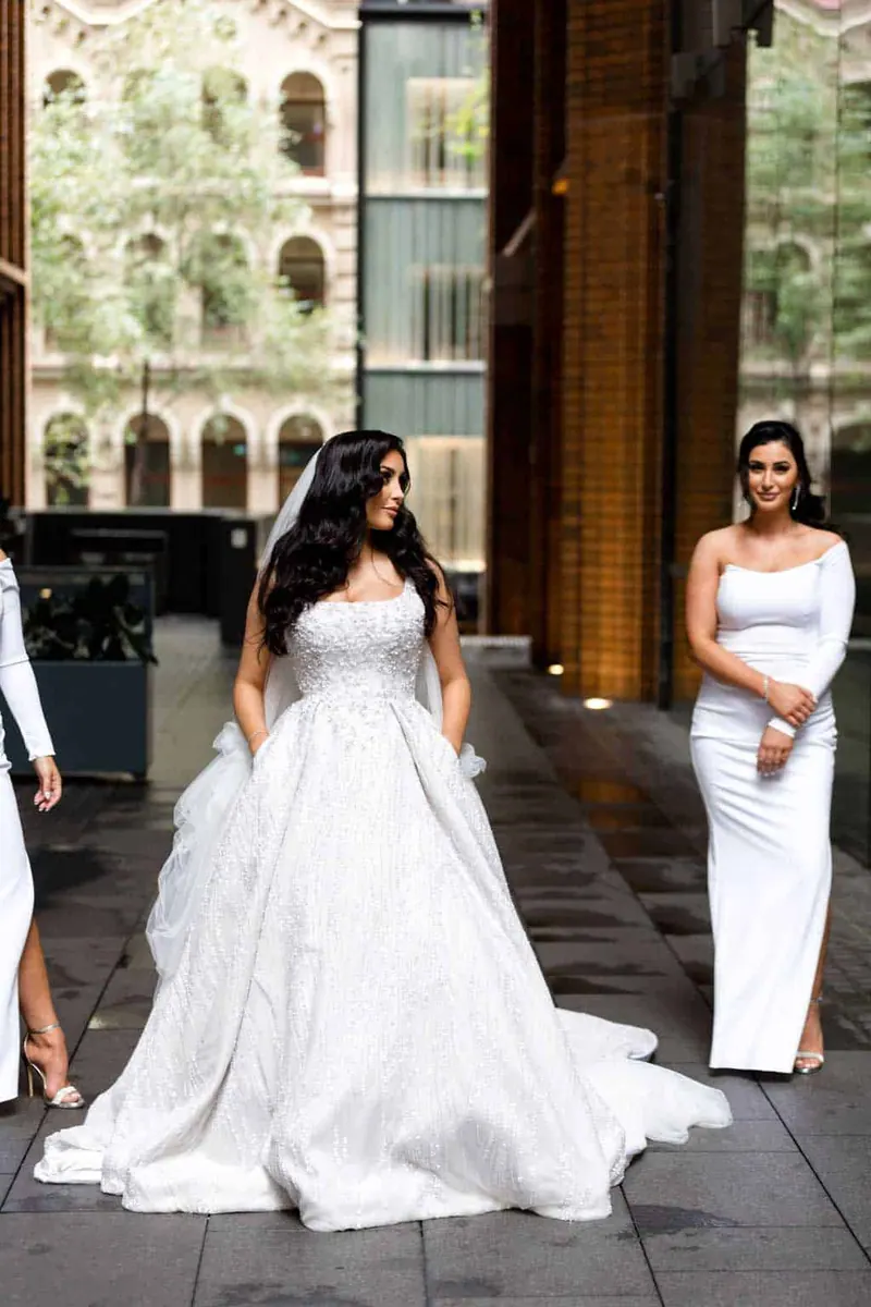 Lauren’s couture wedding dress by Catherine Colubriale