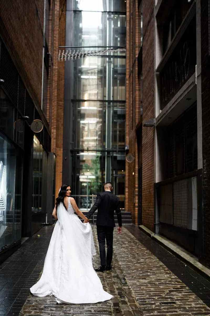 Lauren’s couture wedding dress by Catherine Colubriale
