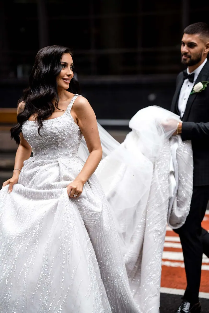 Lauren’s couture wedding dress by Catherine Colubriale