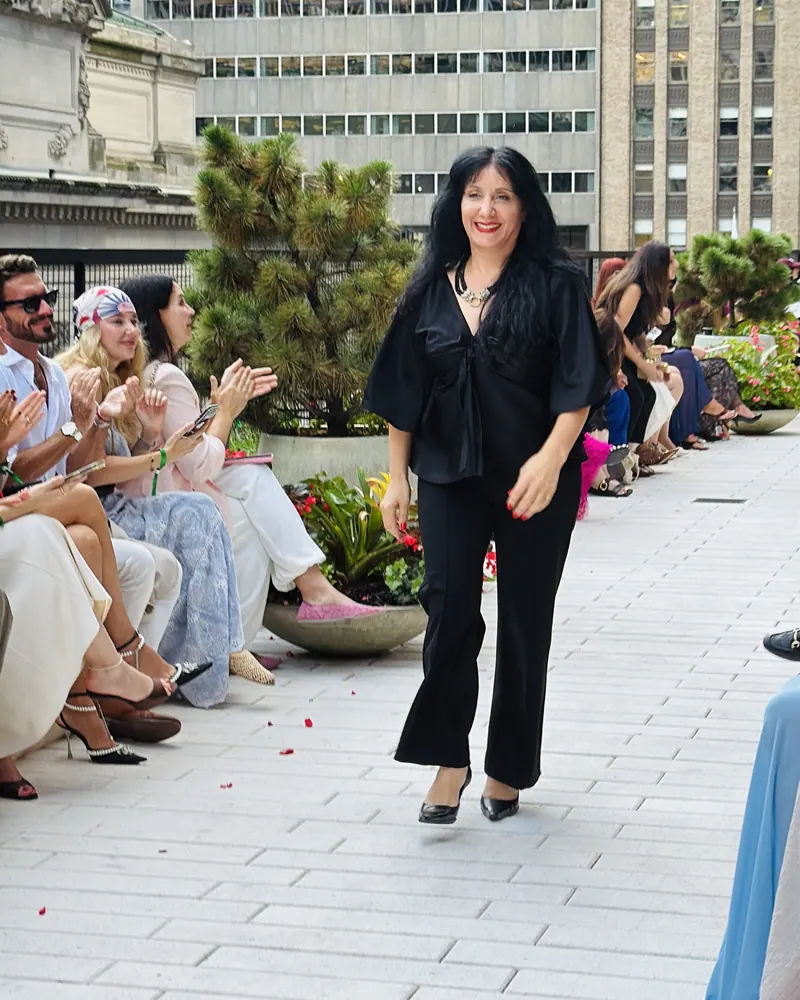 Catherine Colubriale walking the runway at the close of her New York Fashion Week show