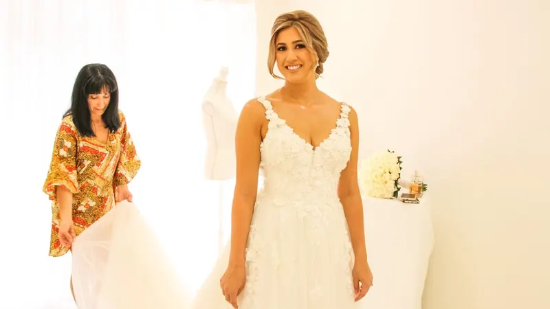 Samantha’s couture wedding dress by Catherine Colubriale