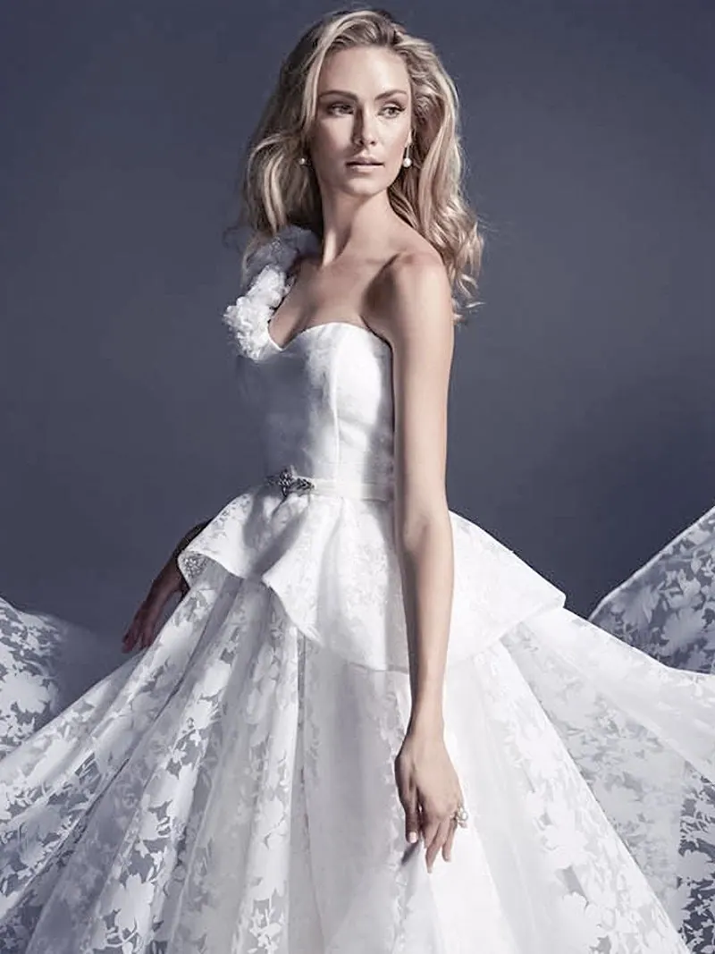 A white bridal gown with a peplum
